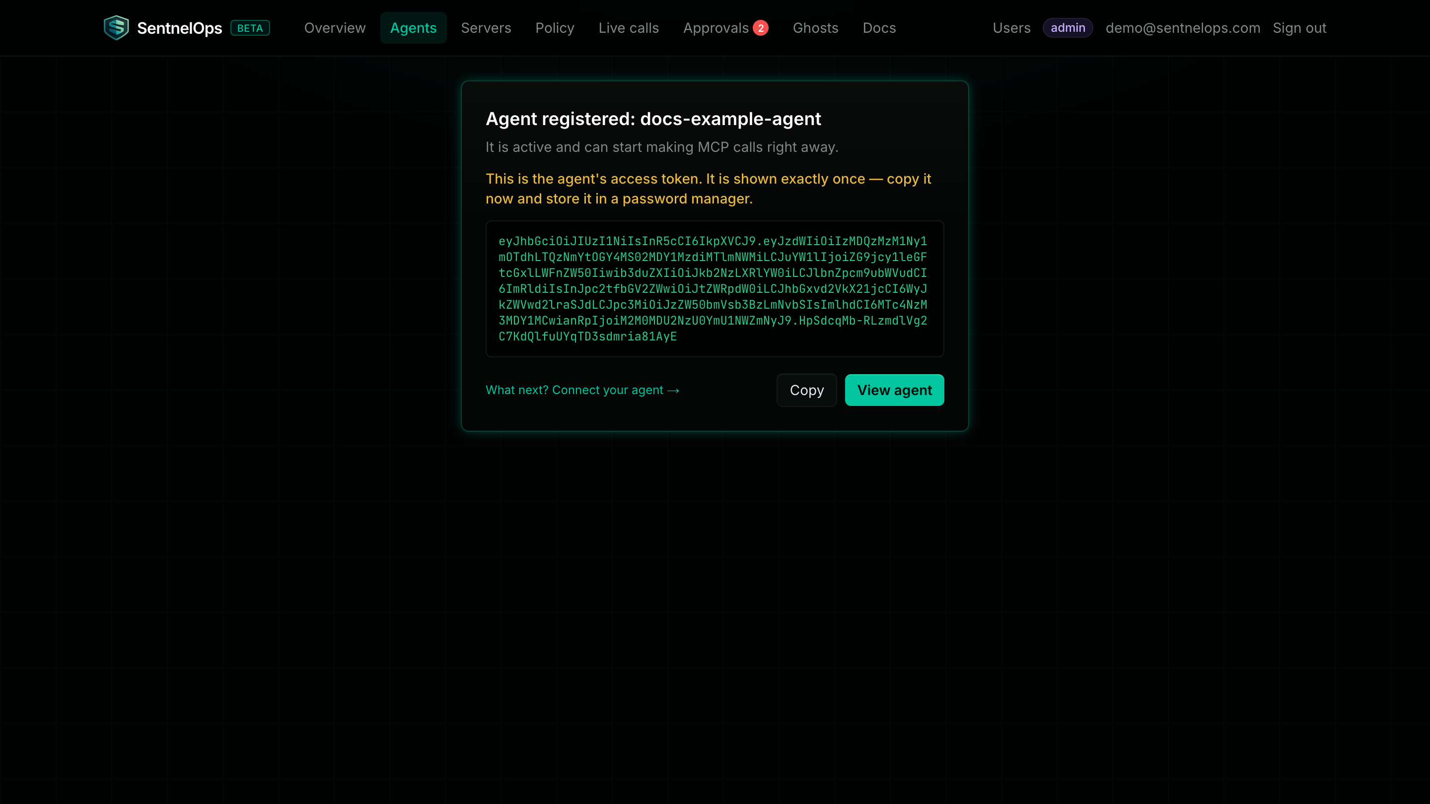 The Agent registered confirmation screen showing a one-time access token, a warning that it is shown exactly once, a Copy button, and a link labelled What next? Connect your agent
